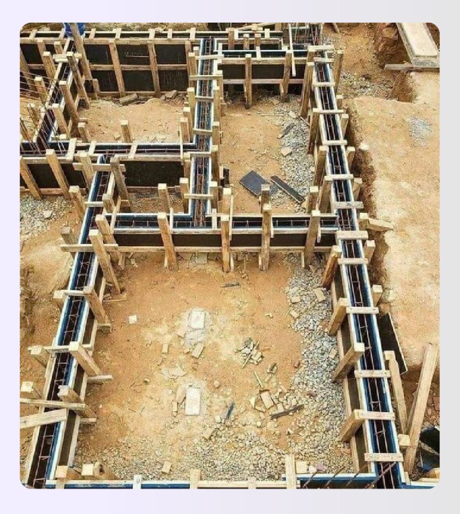 Construction site with concrete foundation and framing Construction site with concrete foundation and framing