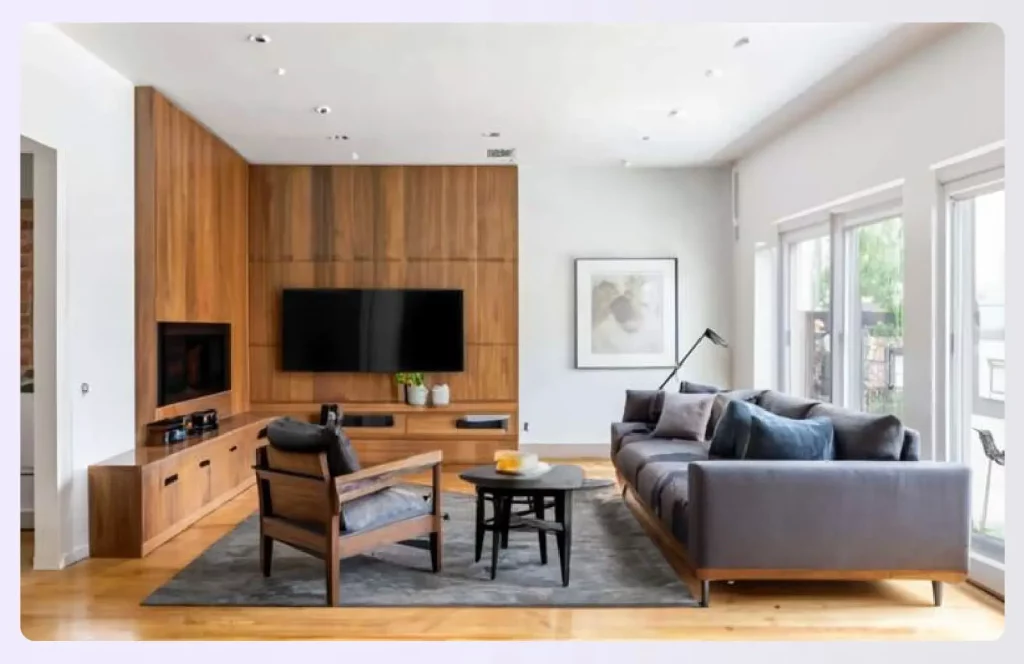 A modern living room featuring a wooden accent wall