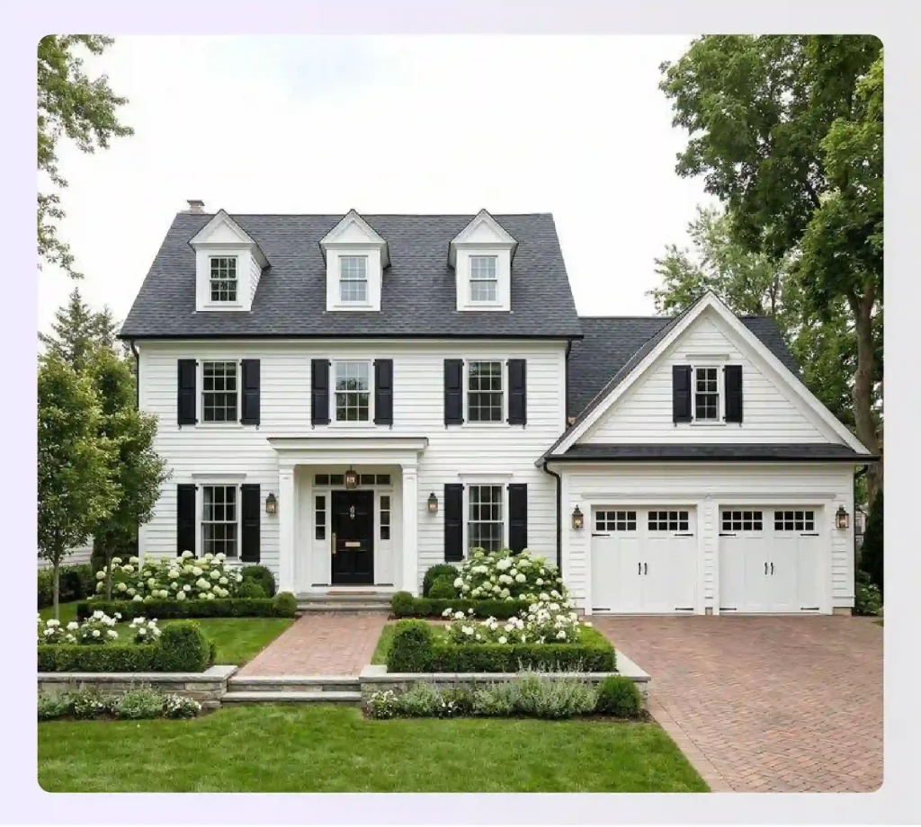 White colonial two-story house with centered entry and attached garage White colonial two-story house with centered entry and attached garage